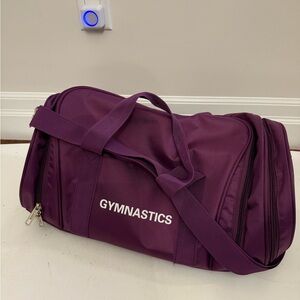 Purple gymnastics duffel bag with separate shoe compartment